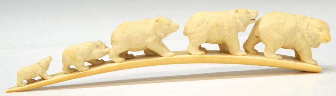 UNUSUAL LARGE BEAR PROCESSION CARVED IVORY TUSK: **This lot will not be shipped Internationally** Unusual figural carved ivory tusk, a procession of five bears graduated in size cross an arched bridge, the second to last with his paw up, with age ye