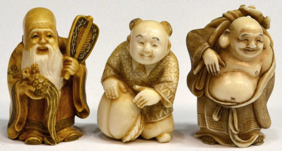 (3) JAPANESE FIGURAL IVORY NETSUKE: **This lot will not be shipped Internationally**(lot of 3) Japanese figural ivory netsuke: (1) Hotei, the 'Laughing Buddha' standing with his treasure sack, fan and brush suspended over his back, pigm