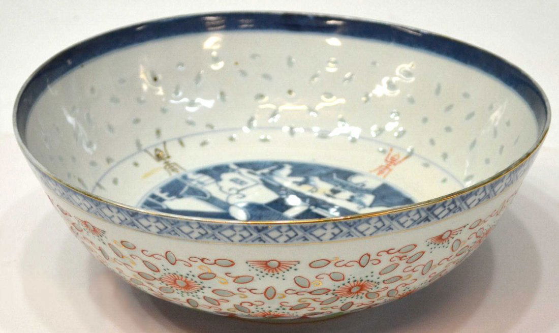 CHINESE EXPORT FAMILLE ROSE RICE PATTERN BOWL: Large Chinese export Famille Rose bowl, 19th c., in the rice pattern, center with pavilion and figure crossing a bridge, outside in a colorful leaf pattern, marked 'China' underfoot, some slight disco