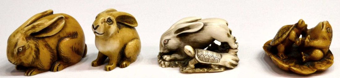 (4) JAPANESE IVORY NETSUKE OF ANIMALS: **This lot will not be shipped Internationally**(lot of 4) Japanese tinted or stained ivory netsuke of animals: (1) a rabbit and minogame (mythical turtle) in a race, stained accents, signed Ikkosai; 