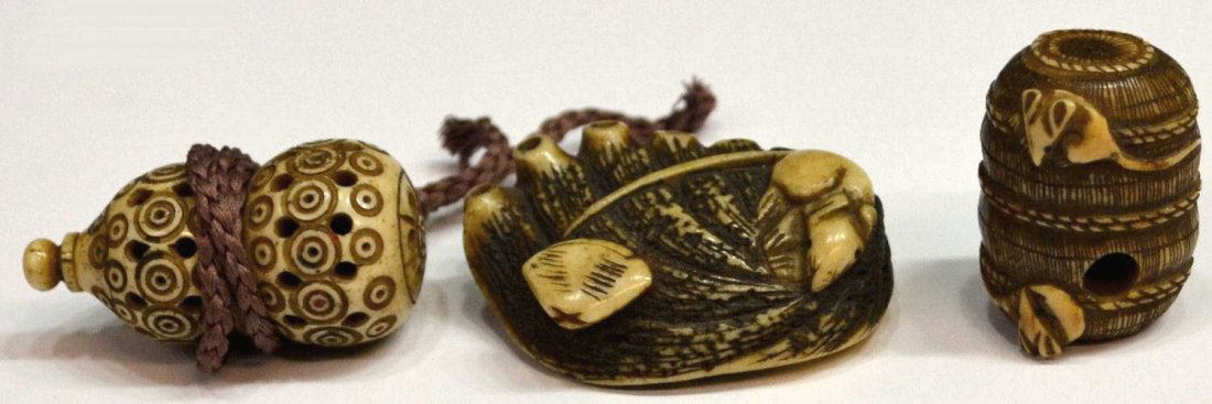 (3) JAPANESE STAG ANTLER/HORN NETSUKE: (lot of 3) Japanese tinted stag antler or bone netsuke, each with dark pigment accents: (1) stag antler toggle carved as an abalone (awabi) surmounted by a small bivalve and a rat, the textured surfac