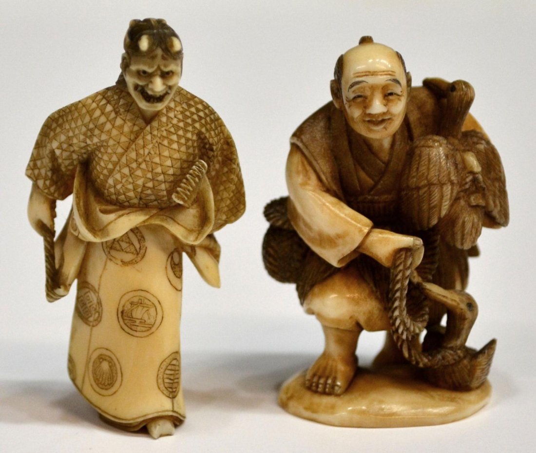 (2) JAPANESE IVORY FIGURAL NETSUKE: **This lot will not be shipped Internationally**(lot of 2) Japanese ivory figural netsuke, each with finely incised and stained details: (1) Noh drama actor wearing the mask of Hannya (female demon) a