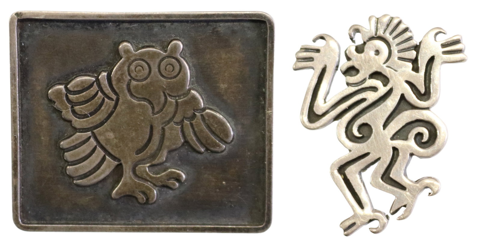(2) DOMINGUEZ & AGUILAR TAXCO MX SILVER BROOCHES: (lot of 2) Silver brooches, including: (1) 960 silver brooch, signed RD verso (Rafael Dominguez, Taxco, Mexico, 1911-1980), with central owl motif, approx 1.5"h, 1.75"w; (1) 940 silver brooch, Hector 