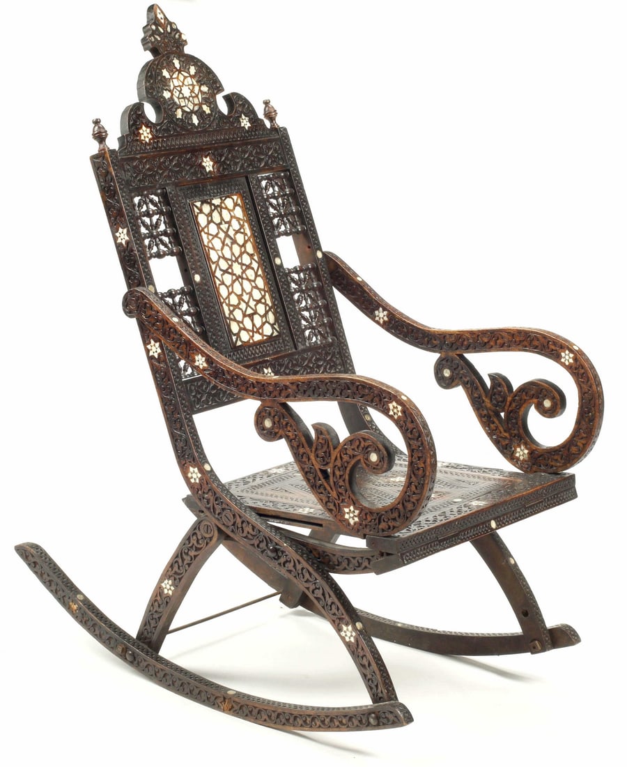 SYRIAN CARVED MOTHER-OF-PEARL INLAID ROCKING CHAIR: Syrian carved and mother-of-pearl inlaid rocking chair, approx 46"h, 20.5"w, 34"d Start Price: $300.00