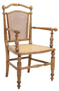 FRENCH CANED FAUX BAMBOO ARMCHAIR: French armchair, late 19th/ early 20th c., turned faux bamboo frame, cane back and seat, on stretcher-joined legs, underside of seat stamped depose, approx 38.75"h, 24.25"w, 21"d, seat height: 18"h St