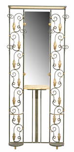 ART DECO PARCEL GILT WROUGHT IRON HALL TREE: Art Deco wrought iron hall stand, c.1940s, flat mirror plate above the marble shelf, framed by parcel gilt scrolls and foliates, six hooks, umbrella stand at either side, chip to mirror plate, approx