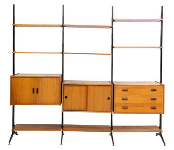 ITALIAN MID-CENTURY MODERN TEAK MODULAR WALL UNIT: Italian mid-century modern teak modular bookcase, c.1960s, black steel supports, nine open shelves, one unit with dual sliding doors, one with three drawers, one with double-door cabinet, approx 78"h,