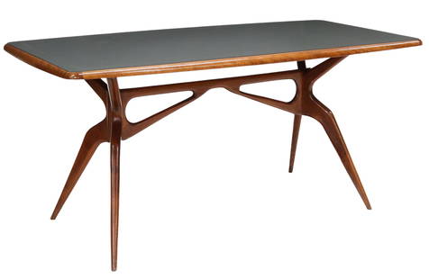 ITALIAN MID-CENTURY MODERN SCULPTURAL DINING TABLE: Italian mid-century modern dining table, c.1960s, inset glass top with banding, rising on stretcher-joined tapered legs, approx 30.5"h, 66.75"w, 33"d, clearance: 29.25"h Start Price: $600.00