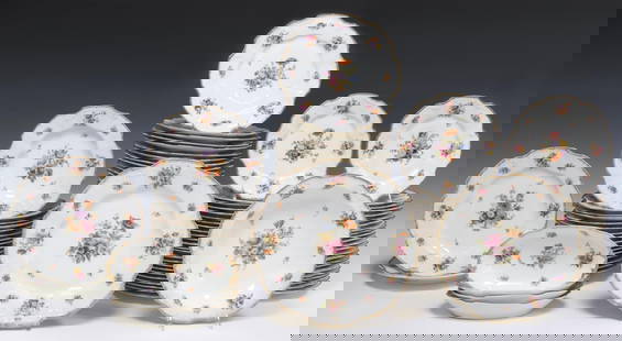 (118) FRENCH LIMOGES PORCELAIN DINNER SERVICE: (lot of 118) French Limoges porcelain partial dinner service, with transferred floral motifs similar to Dresden Flowers, parcel gilt trim, marked Limoges France underfoot, including: (34) dinner plate