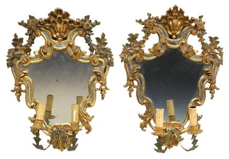 (2) ITALIAN GILTWOOD & TOLE GIRANDOLE MIRRORS: (pair) Italian giltwood mirrored two-light sconces, late 19th c., having fanned crest with foliate swag, over shaped cushion frame, encasing flat mirror plate, issuing two scrolled arms, terminating o