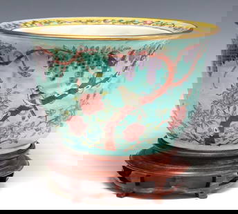 CHINESE FAMILLE ROSE PLANTER WITH STAND: Chinese famille rose planter, having a character mark to the central well, turquoise-glazed exterior depicting birds amongst blooming fruit and flower trees, rising on wood stand, planter: approx 6 7/
