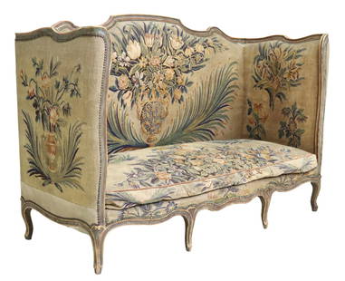 FRENCH LOUIS XV STYLE TAPESTRY UPHOLSTERED DAYBED: French Louis XV style daybed/ lit d'alcove, 18th/ 19th c., parcel gilt and painted frame, shaped back and sides in woven Aubusson tapestry upholstery, bench seat, on cabriole legs, approx 50.75"h, 74"