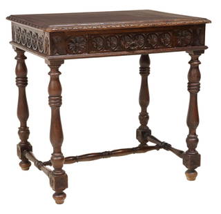 FRENCH CARVED OAK WRITING TABLE: French oak writing table, 19th c., parquetry tabletop, apron carved with repeating floral motif roundels, single frieze drawer, on turned legs joined by H stretcher, approx 30.5"h, 31.25"w, 23.5"d Sta