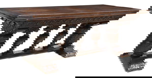 RENAISSANCE REVIVAL CARVED OAK DRAW-LEAF TABLE: Renaissance Revival carved oak extension table, early 20th c., having rectangular top, concealing two pull-out leaves, rising on bulbous foliate carved supports, ending on molded shoe base, approx 30"