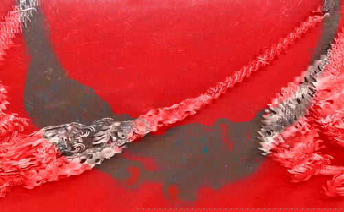 CHINESE STERLING SILVER DRAGON NECKLACE IN FRAME: Chinese sterling silver collar necklace, hinged frame with textural scales, centering figural dragon with inset red coral cabochons and blue beads, marked 925 at side, hinge broken at right side, now