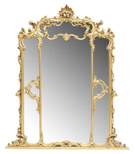 LARGE LOUIS XV STYLE GILTWOOD OVERMANTEL MIRROR: Large Louis XV style giltwood overmantel mirror, early 20th c., having fanned crest, over scrolled foliate cushion frame, encasing flat mirror plate, approx 71"h, 61.5"w, approx 73 lbs Start Price: $2