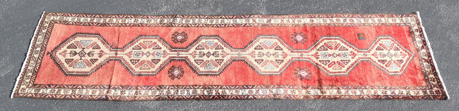 ESTATE HAND-TIED RUNNER, 13'0" X 3'6": Estate hand-tied runner, approx 13'0"l, 3'5.75"w **Please Note: All of the rugs offered in this auction would likely benefit from a professional cleaning. Estate rugs may show some wear and imperfecti