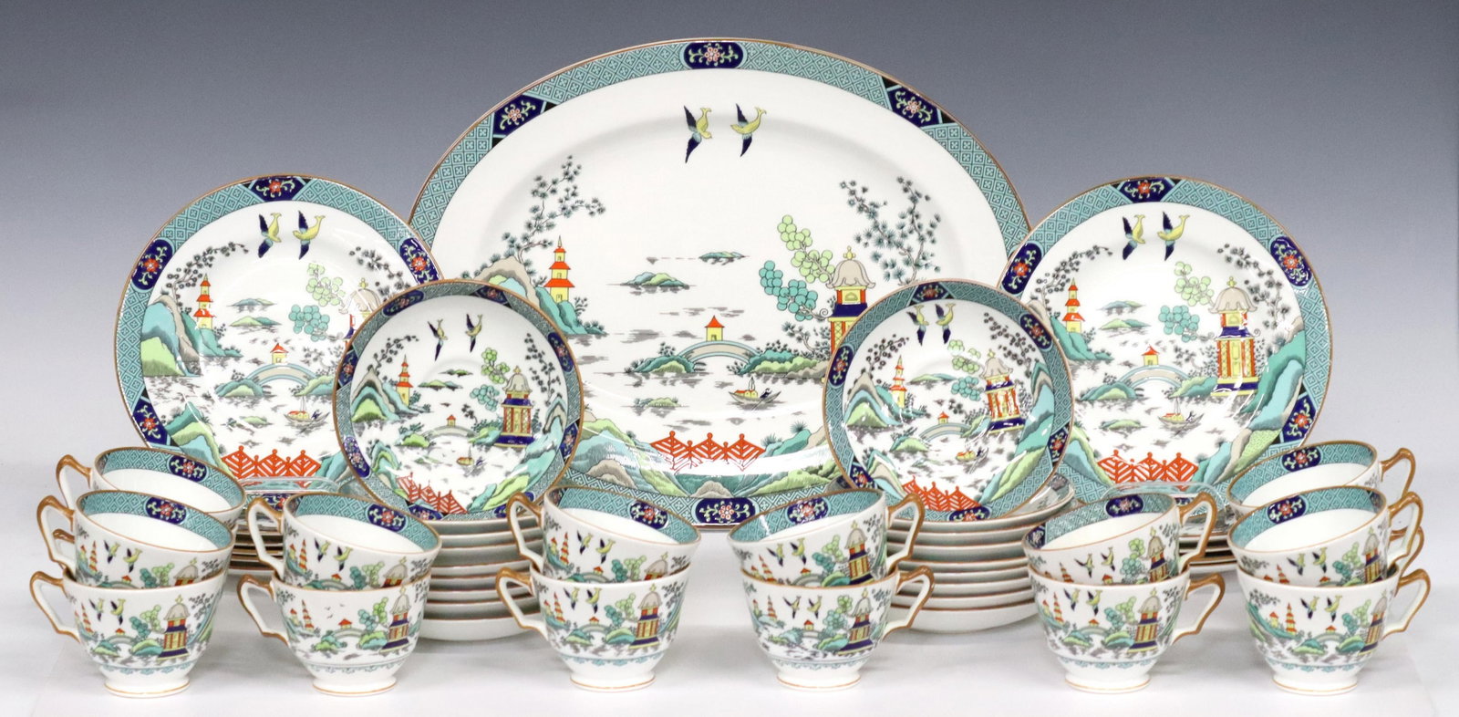 46) ENGLISH CHINESE WILLOW PARTIAL DINNER SERVICE: (lot of 46) English bone china partial service, assembled, makers include Coalport and Crown Staffordshire, in "Chinese Willow" pattern, each with maker's mark underfoot, including: (1) service platte