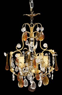 ITALIAN GILT IRON & AMBER GLASS 4-LIGHT CHANDELIER: Italian gilt iron four-light chandelier, 20th c., cage-form frame, faux candle above petal bobeche, amber-colored glass teardrops and pear-shaped faceted drops, interspersed among colorless rosettes,