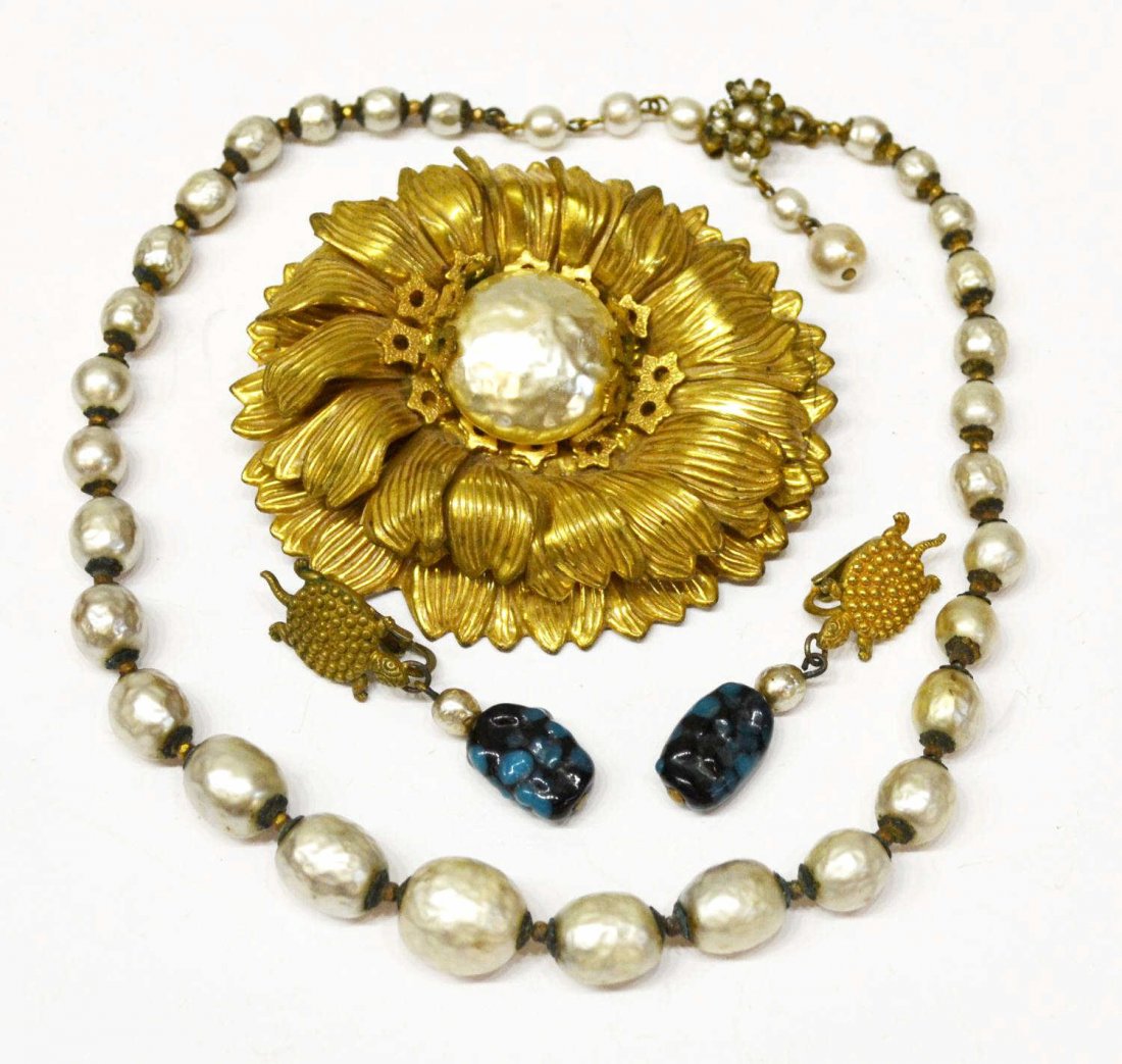 (4)VINTAGE MIRIAM HASKELL FAUX PEARL JEWELRY GROUP: (lot of 4) Miriam Haskell faux pearl jewelry group: (1) large floriform brooch, 2.75"h, 3"l; (1) necklace having graduated faux pearl beads, floriform hook, approx 16"l; (pair) turtle form clip on ear