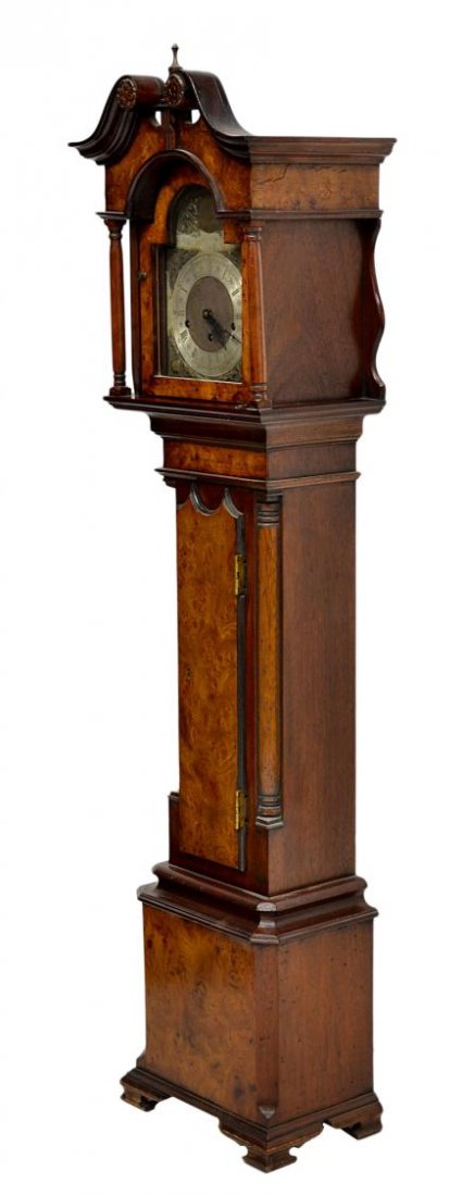 GEORGIAN STYLE CHIMING GRANDMOTHER CLOCK: Georgian style grandmother clock, last quarter 20th c., a scrolled split pediment over a glazed door with clock face marked John Thompson, London, the case mahogany with burl walnut accents set on bra
