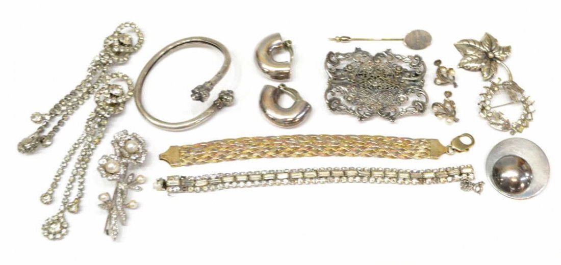 VINTAGE GEORGE JENSEN INC, STERLING, PEARL JEWELRY: (lot of 15) Signed and designer vintage costume and silver jewelry group, including: (1) silver bracelet having lions head terminals, dents; (1) large sterling silver brooch set with rhinestones and f
