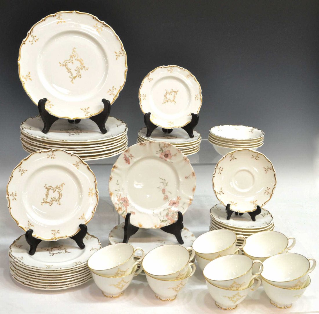 (64) ROYAL DOULTON DINNER SERVICE & LIMOGES PLATES: (lot of 64) Royal Doulton porcelain dinner service in the 'Monteigne' pattern, fine white porcelain decorated with gilt scrolling tendrils and flowers, service for eight plus extras, comprising: (9) d