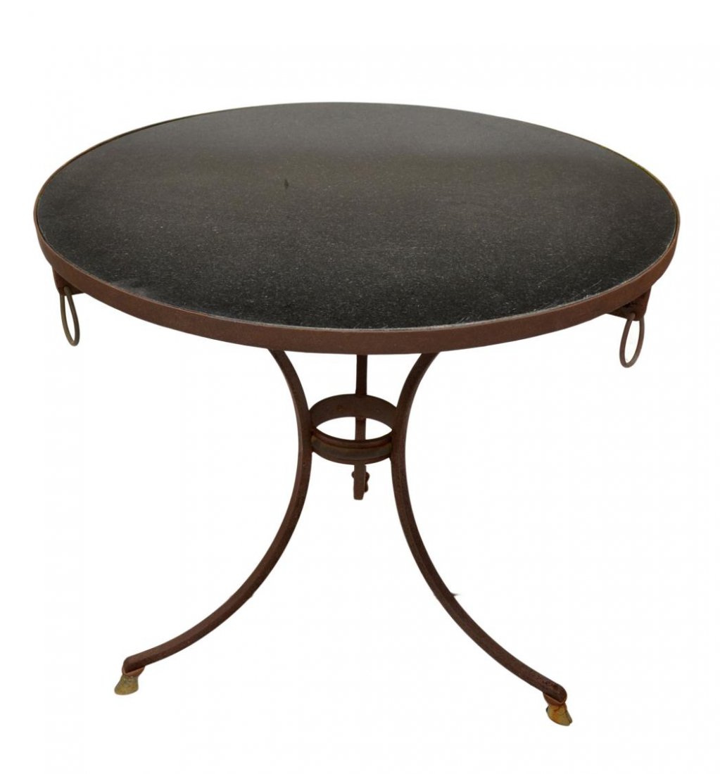 IRON FRAMED GRANITE TOP TABLE: Iron framed circular granite top table on splayed legs with hoof feet, 28"h, 31.25d Start Price: $100.00