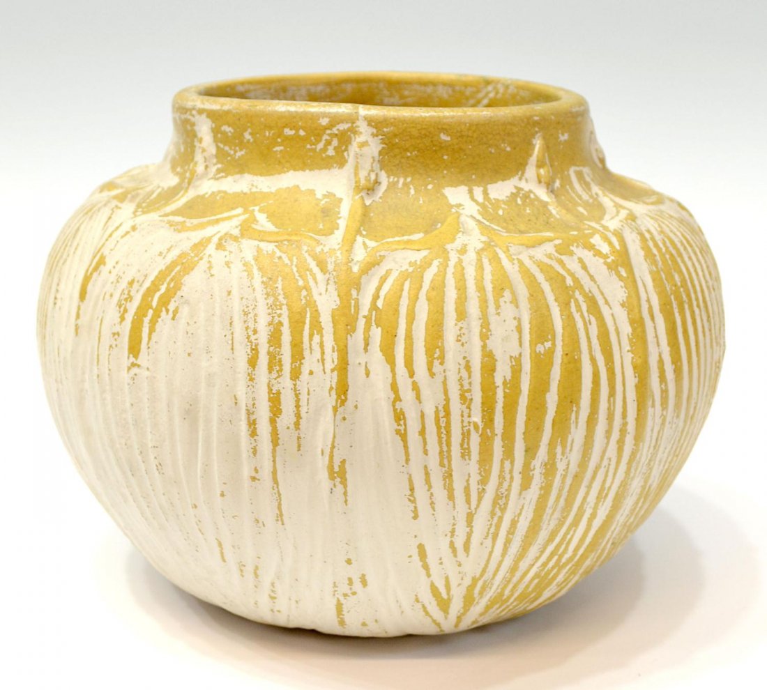 GRUEBY STYLE ART POTTERY VASE MARKED WP: An art pottery vase in the style of Grueby, raised leaf and bud design in matte ocher glaze having remnants of white finish, raised marks underfoot WP, C35, as pictured, 7.25"h, 5.5lbs Start Price: $1