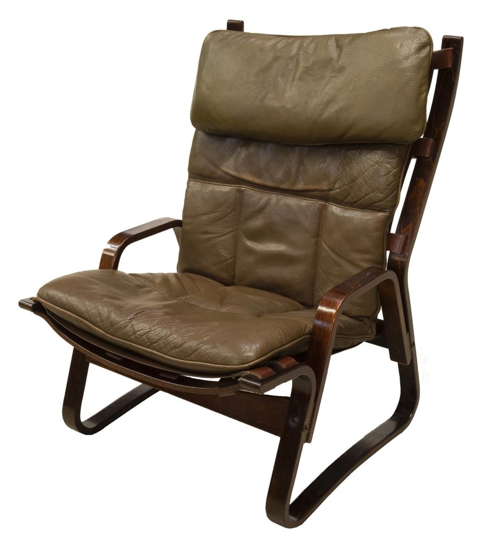 SCANDINAVIAN MODERN BENTWOOD LEATHER LOUNGE CHAIR: Scandinavian modern bentwood armchair, c.1970s, with brown leather upholstery, rising on dark stained beech framed, approx 36.75"h, 25"w, 23"d, seat height (at edge of seat): approx 17"h Start Price: