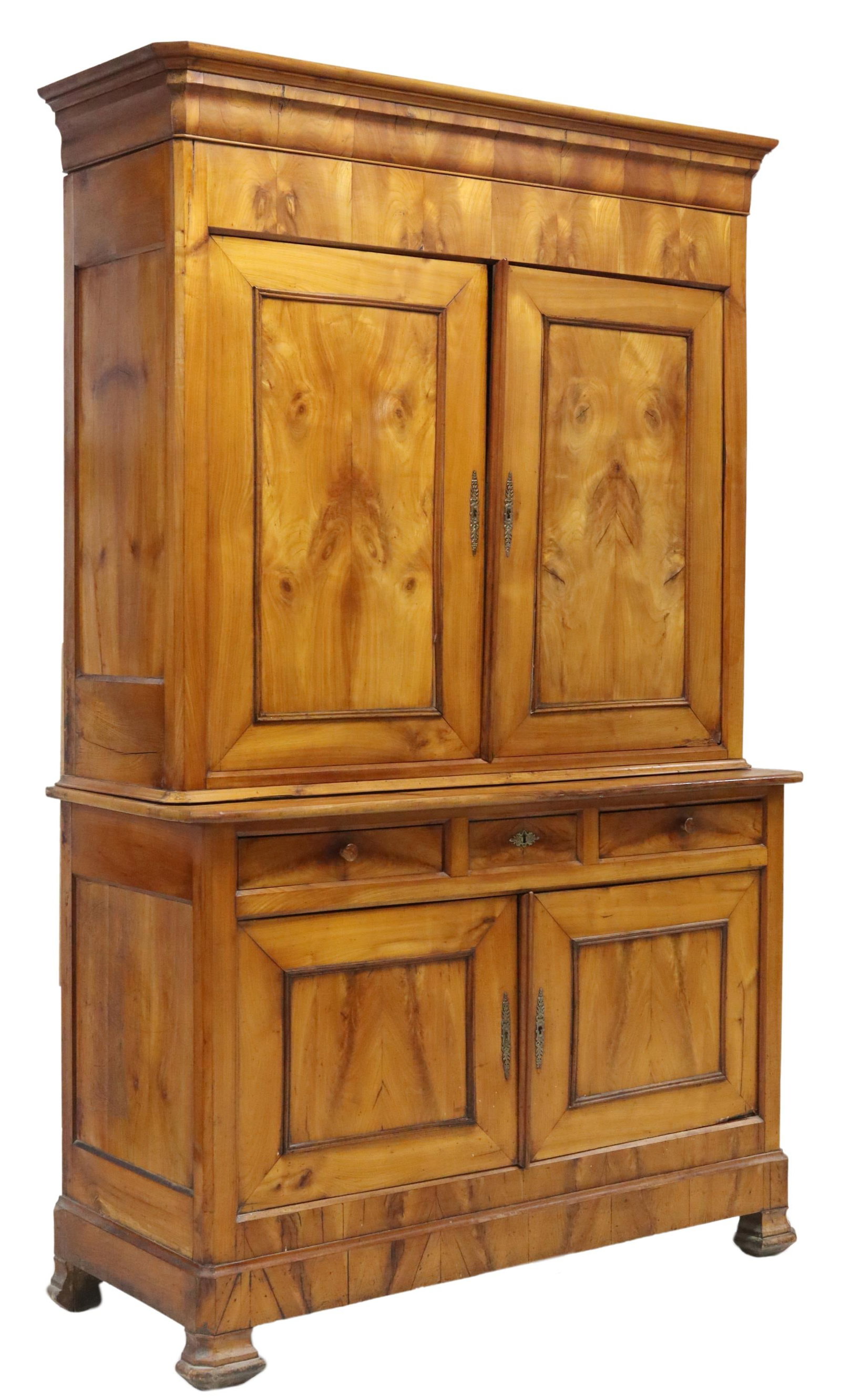FRENCH LOUIS PHILIPPE PERIOD FRUITWOOD SIDEBOARD: French Louis Philippe period fruitwood sideboard / cabinet, mid 19th c., molded cornice, upper doors opening to two shelves, lower section with three frieze drawers, double-door cabinet with an interi