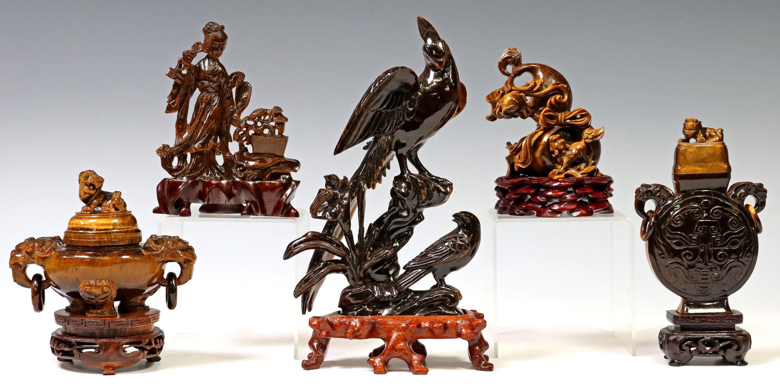 5) CHINESE CARVED TIGER'S EYE FIGURES CENSER & URN: (lot of 5) Chinese carved tiger's eye figures and sculptures, most affixed to wood base, including : (1) two birds/ phoenix on naturalistic branch, (1) depicting foo lion emerging from gourd-form cavi