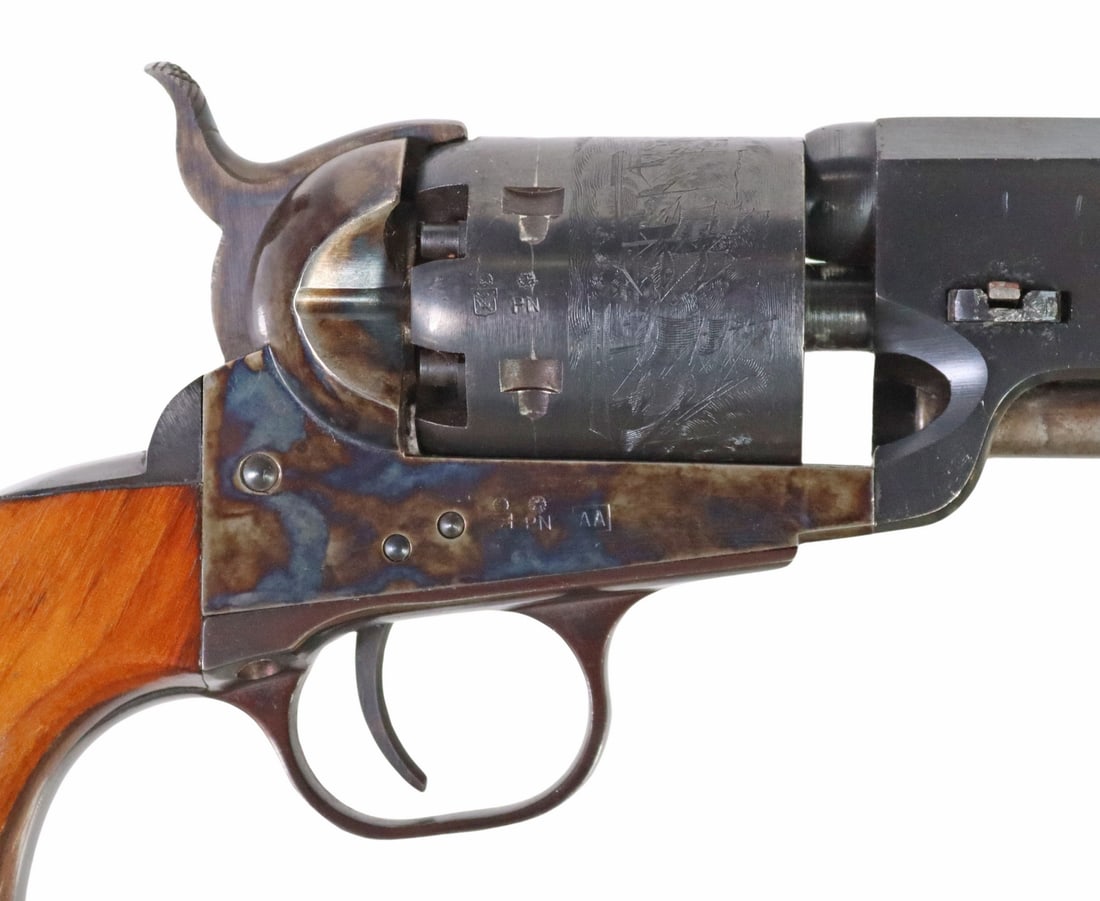 UBERTI 1851 COLT NAVY STEEL FRAME REVOLVER: Italian Uberti Colt 1851 Navy steel frame black powder revolver, c.1975 .36 caliber, the 7.5" octagonal barrel with front sight marked "London," the six round cylinder roll engraved with the1843 battl