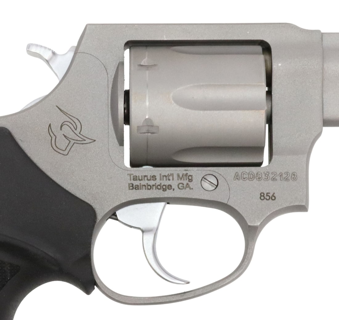 TAURUS M856 DA .38 STAINLESS STEEL REVOLVER: Taurus Model 856 revolver, double action, stainless steel finish, .38SPL caliber, 2" barrel, ramp front sight, six round swing out cylinder, rubberized grips, housed in original box, 98% finish with c
