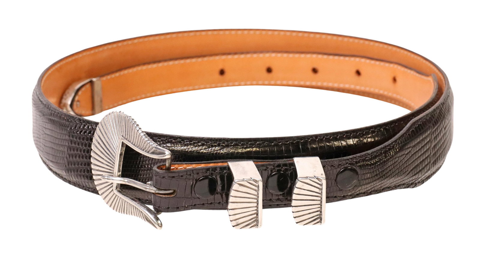 JAMES REID SANTA FE STERLING RANGER BUCKLE SET: Western four-piece sterling silver ranger buckle set, incised radiating pattern, (one) buckle, approx 2"l, 1 11/16"w, (two) keepers, (one) tip, on a tapered 0.75"-1.25" black reptile-pattern leather b