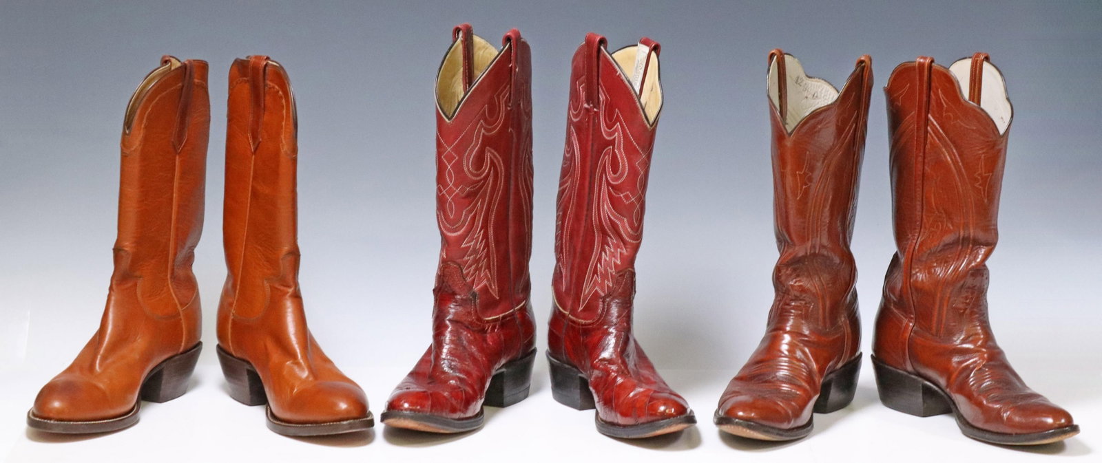 3PR) MEN'S LEATHER COWBOY BOOTS, ADAMS & PAUL BOND: (3 pair) Men's leather cowboy boots, including: (1) Adams Boot Company, in maroon leather, with patchwork vamp and stitched shaft, some peeling to leather at vamp, approx 14.75"h, 11.25"l (toe to heel