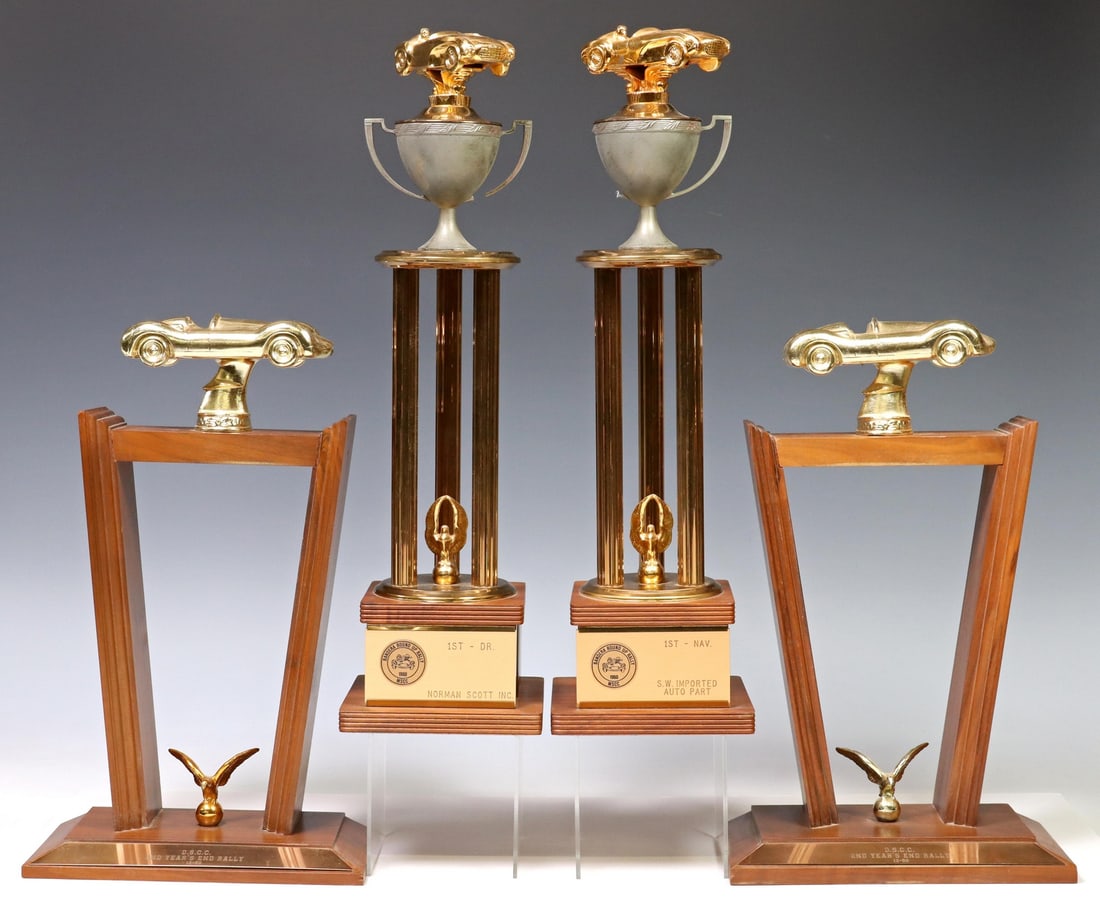 (4) VINTAGE 1950 & 1960 AUTOMOBILE RACING TROPHIES: (lot of 4) Vintage American automobile racing trophies, both sets engraved plaques devoting one trophy to driver, the other to navigator, all crafted of wood and gold-toned metal, including: (2) Bande