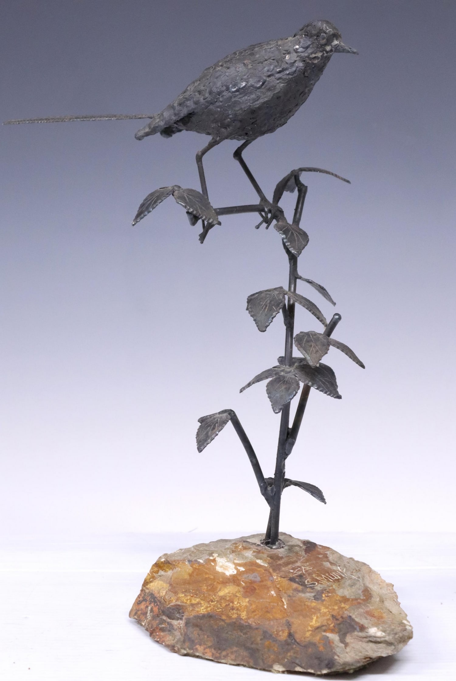 SIGGI MUNK (TX) METAL & STONE BIRD SCULPTURE: Patinated metal and stone sculpture, Bird on a Branch, signed at base S. Munk (Siggi Munk, Texas, 20th c.), approx 14.5"h, 12"w, 7"d, 5.5lbs **Provenance: From the estate of Leslie and Angelyn Smith, 