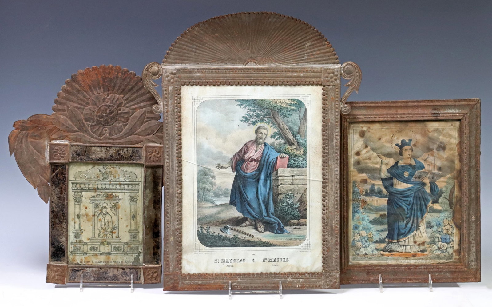 (3) FRAMED RETABLO PRINTS, RELIGIOUS FIGURES: (lot of 3) Framed retablo prints, Mexico, each housed in an embossed metal nicho/ frame, including: (1) Saint Matthew, (1) Saint Thomas Aquino, (1) El Senor de la Cana, largest retablo: approx 13 5/8"