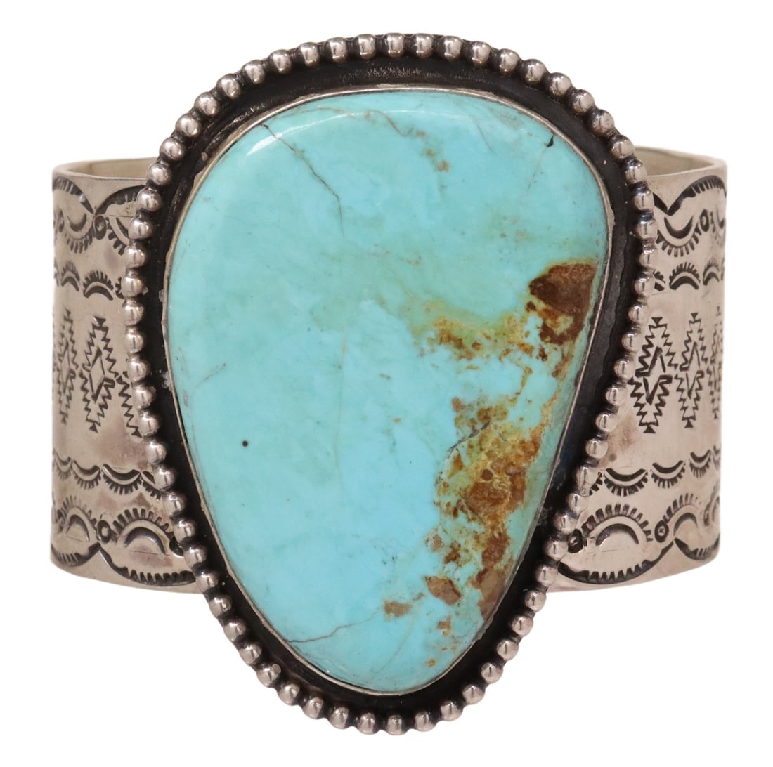 SOUTHWEST STERLING & TURQUOISE STAMP WORK CUFF: Southwest sterling silver cuff bracelet, signed JG, possibly Juan Guerrero, large bezel-set turquoise plaque, beaded edge, on a stamp work cuff, approx 2 5/8"w, interior: approx 5 7/8"l, gap: approx 1