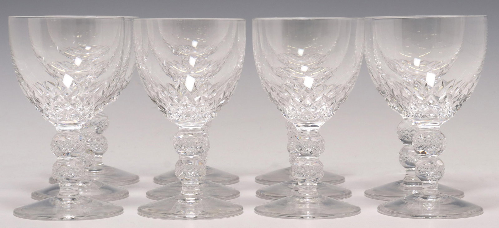 (11) FRENCH ST LOUIS CUT CRYSTAL WINE GLASSES: (lot of 11) French St Louis crystal wine glasses, diamond-pattern cut bowl, stem with two knops, on a plain foot, acid-etched mark, (two) with small chips at rims, approx 5 1/8"h, 2 7/8"diam; 5.25lbs 