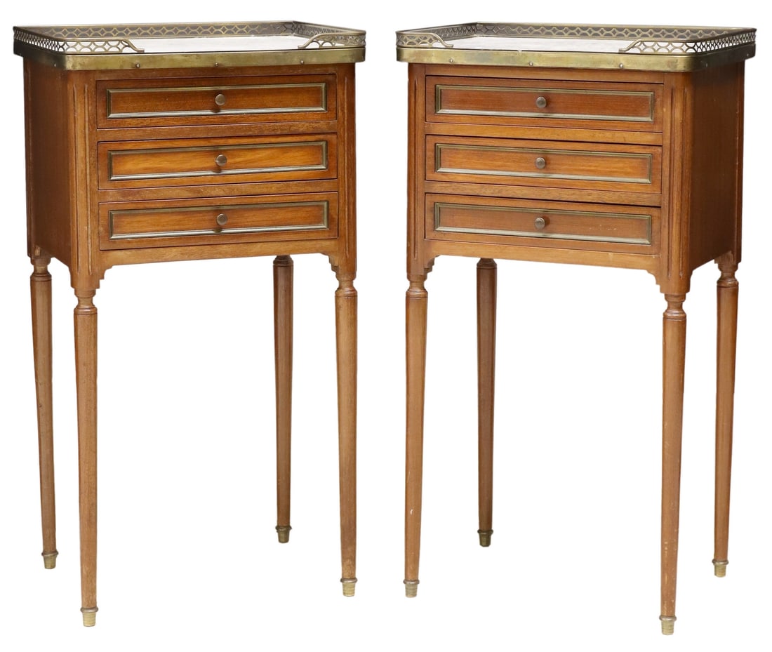 2) LOUIS XVI STYLE MARBLE-TOP MAHOGANY NIGHTSTANDS: (pair) French Louis XVI style mahogany nightstands, 20th c., inset marble top with gilt metal gallery, over three drawers, rising on tapered legs, approx 29.25"h, 15.5"w, 12"d Start Price: $300.00 **N