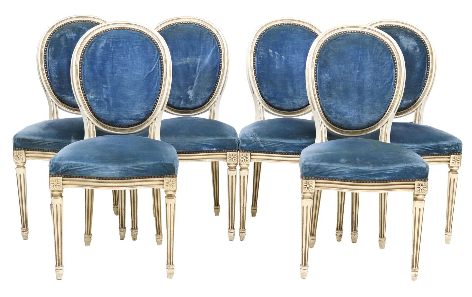 (6) FRENCH LOUIS XVI STYLE PAINTED DINING CHAIRS: (lot of 6) French Louis XVI style side chairs, early 20th c., each in a white painted finish, having oval medallion back and padded seat in blue velvet upholstery, with nailhead trim, rising on taperi