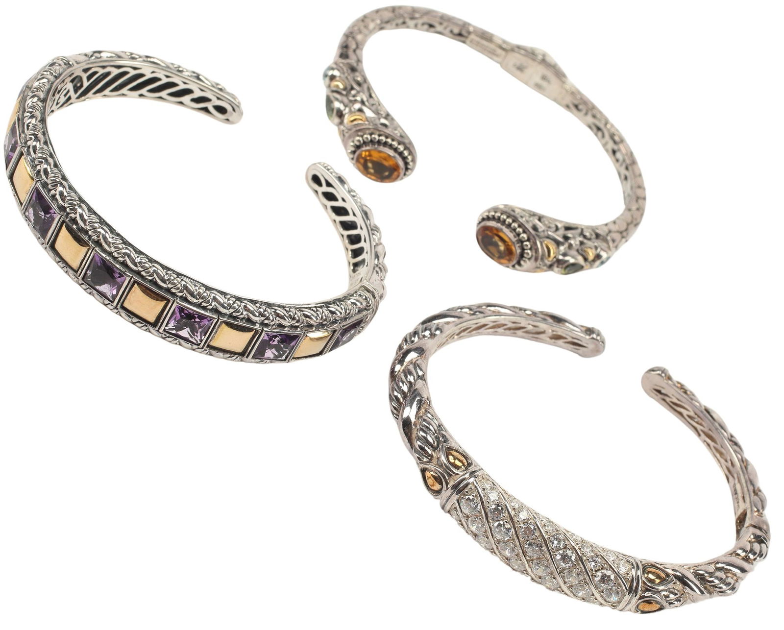 (3) ESTATE STERLING SILVER & 14KT YELLOW GOLD HINGED CUFF BRACELETS: (lot of 3) Estate sterling silver and yellow gold hinged cuffs, including: (1) sterling and 14kt gold, JAI, with cubic zirconia (CZ), interior: approx 6"l, (1) sterling and 14kt gold, J