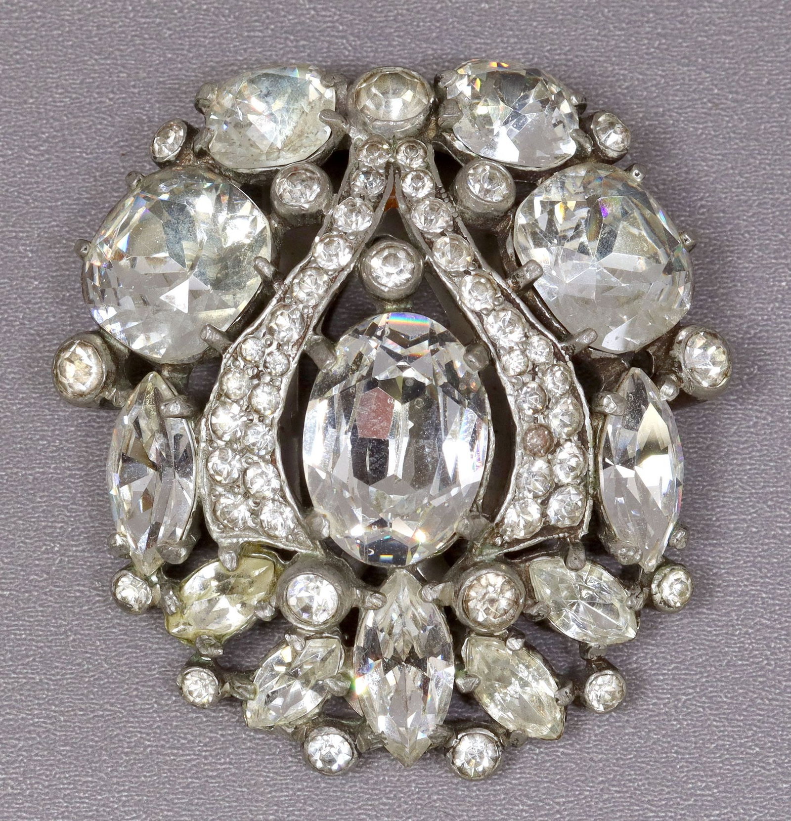 VINTAGE EISENBERG ORGINAL RHINESTONE FUR CLIP: Vintage 'Eisenberg Original' rhinestone silver-tone metal fur clip, incised makers mark on back and clip, approx 2"l, 2"w, .25lbs 