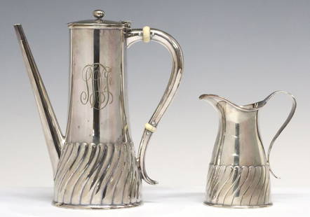 (2) AMERICAN TIFFANY & COMPANY SILVERPLATE TEAPOT & CREAMER: American silverplate table items, Tiffany & Company Makers, each with swirled gadrooning to base, pattern #117, with triple monogram, (one) one-pint teapot, with spacers to handle, marked 21 202,