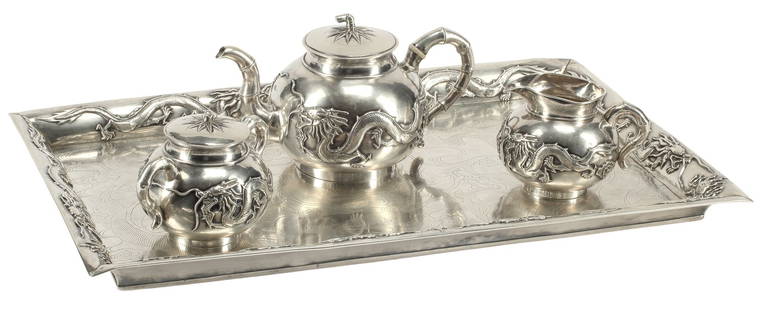 (4) CHINESE EXPORT SILVER DRAGON MOTIF TEA SERVICE WITH TRAY: (4 piece) Chinese Export silver tea service, with bamboo-form handles and spout, including: (1) teapot, (1) creamer, (1) sugar bowl, (1) tray, approx 22"l, 13.5"w; 111.99oz total (