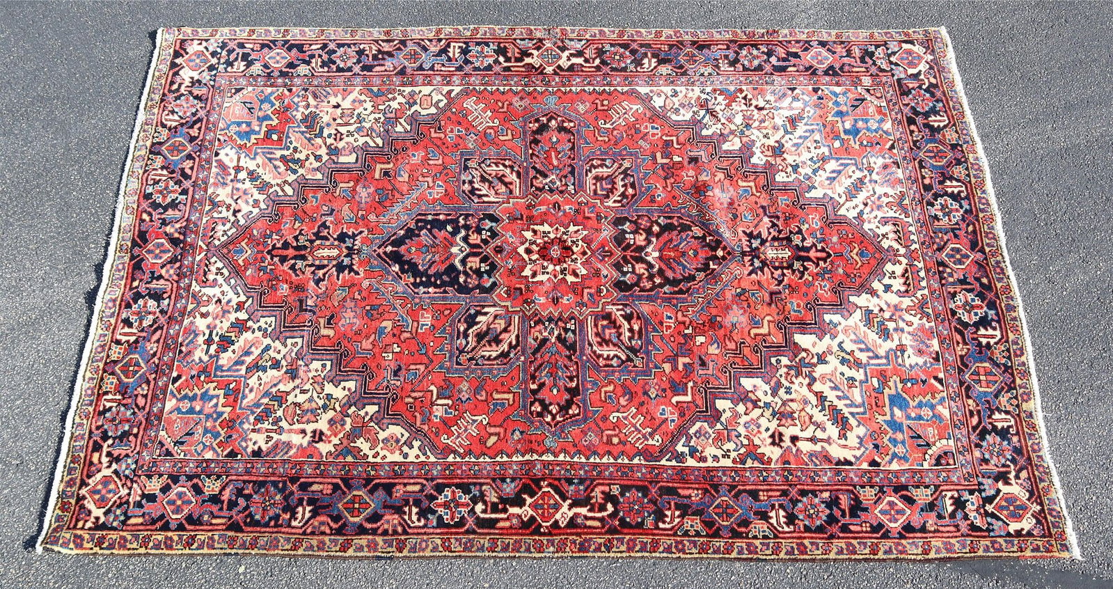 HAND-TIED PERSIAN HERIZ RUG, 9'10" X 7'4": Hand-tied Persian Heriz rug, Iran, approx 9'10"l, 7'4"w **Please Note: All of the rugs offered in this auction would likely benefit from a professional cleaning. Estate rugs may show some wear and imp