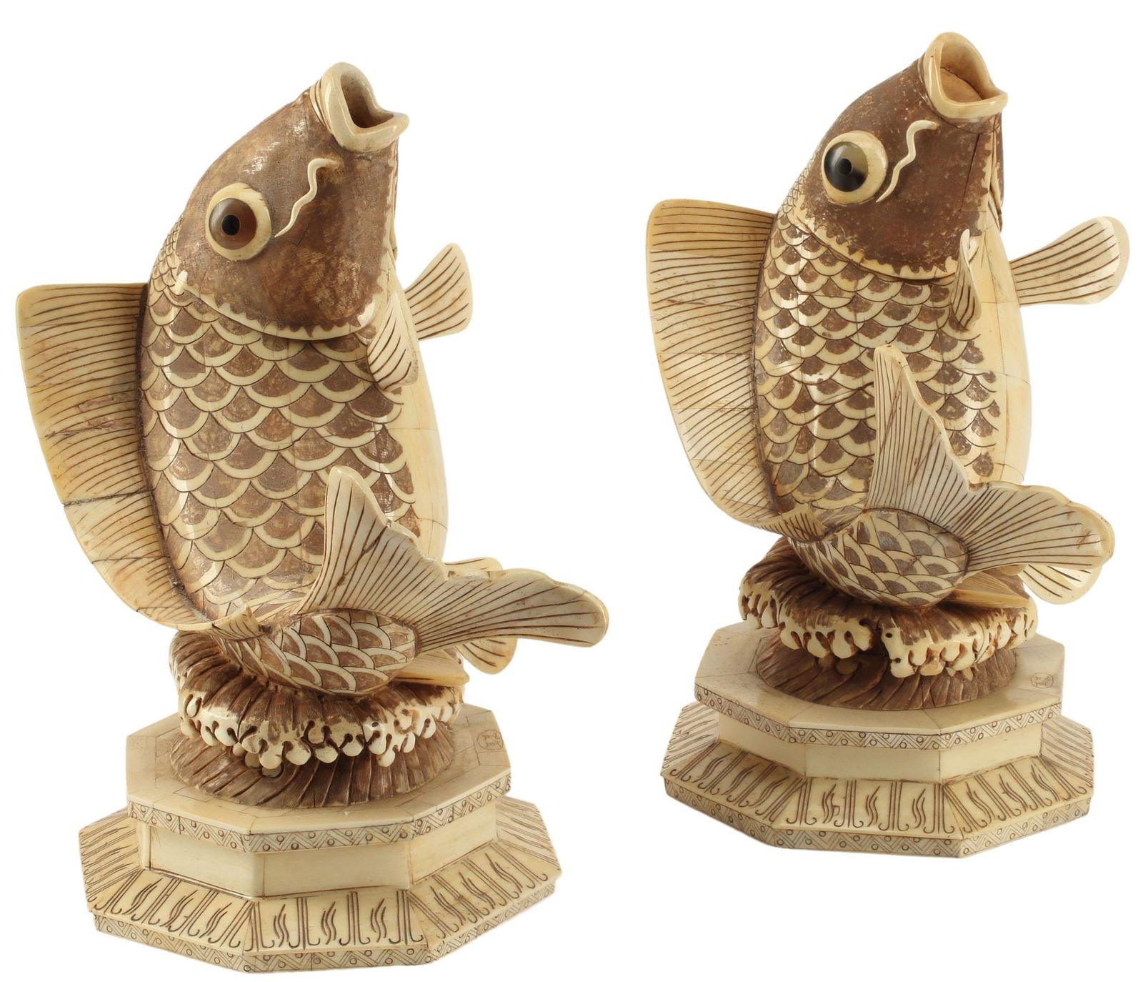 (2) JAPANESE CARVED & TILED BONE LEAPING KOI FISH: (pair) Japanese bone tiled Koi fish, leaping fish above cresting wave, signed on octagonal base, approx 13.5"h, 10"w, 9"d; 11.5lbs total