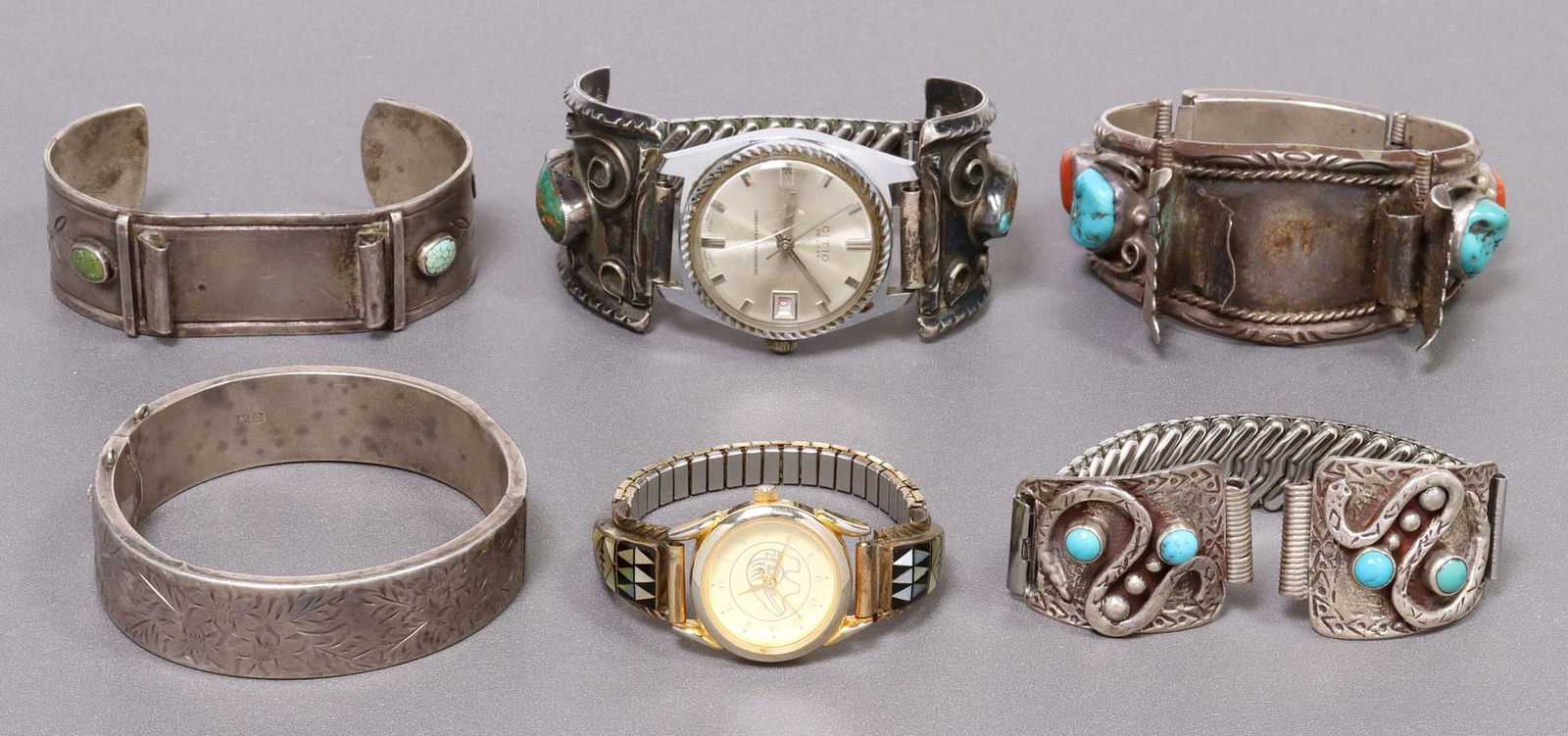 (6) NATIVE AMERICAN SILVER WATCH CUFFS & TIPS: (lot of 6) Native American silver (content unknown) watch cuffs and tips, highlights include: (pair) watch tips with serpent design signed M. Chee, (pair) sterling silver watch tips with shell inlay,
